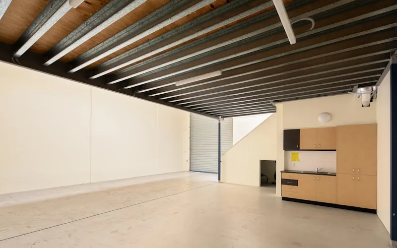 Barndominium open floor plan combining industrial structure with modern living