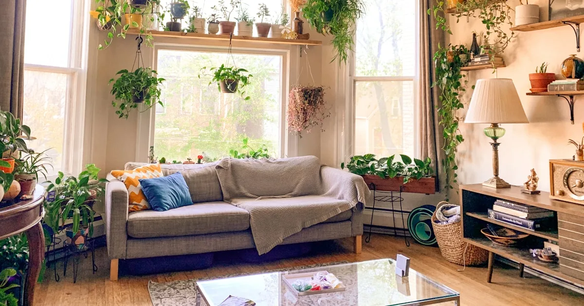 Bohemian living room with rattan furniture and layered textiles