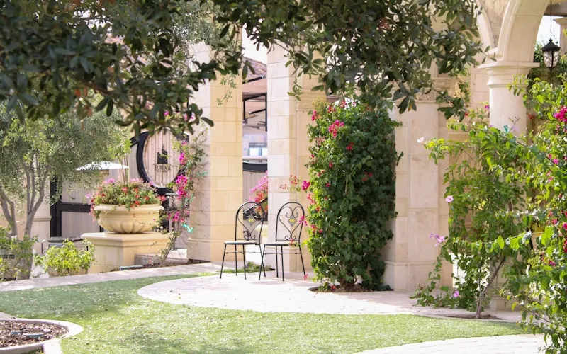 Spanish-style casa with courtyard connecting indoor and outdoor living spaces