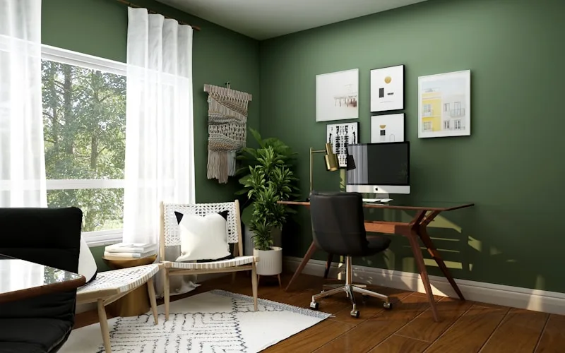 Living room with sage green walls and natural linen curtains showing complementary color pairing