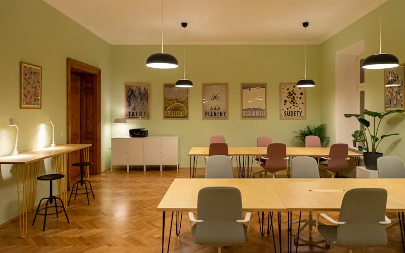 Interior designer presenting material samples during a client consultation