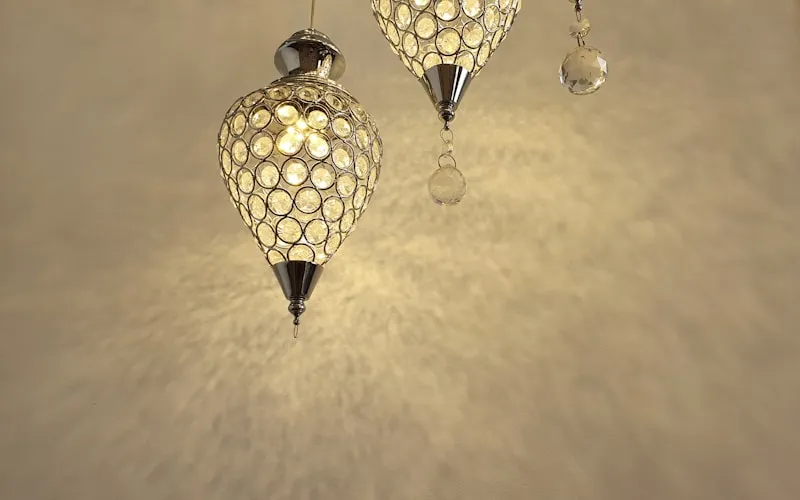 Elegant designer chandelier and pendant lighting in a sophisticated interior