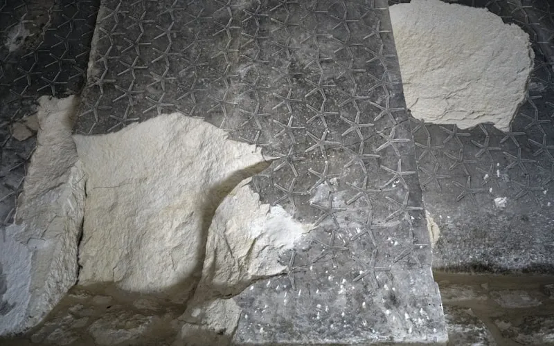 Mediterranean terracotta and natural stone textures in a Greek-inspired space