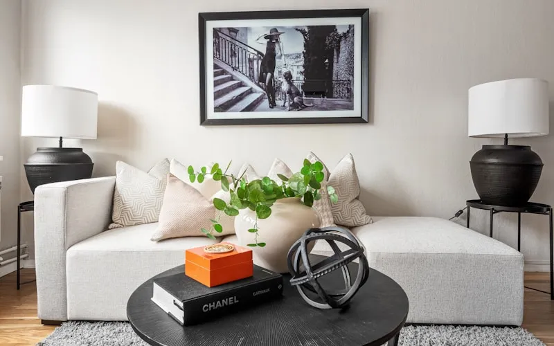 Professionally staged living room with neutral decor and curated accessories