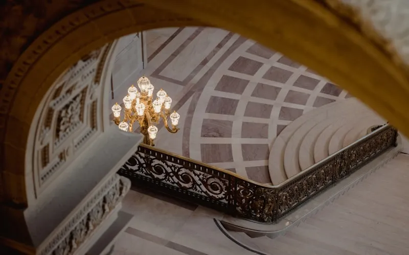 Luxury interior featuring marble surfaces and brass accent details