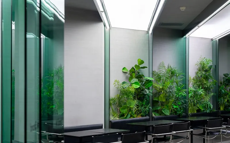 Biophilic interior design with living green wall and abundant natural light