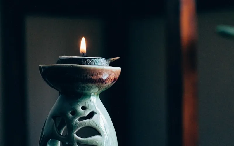 Prayer room with warm brass lamps and spiritual lighting design