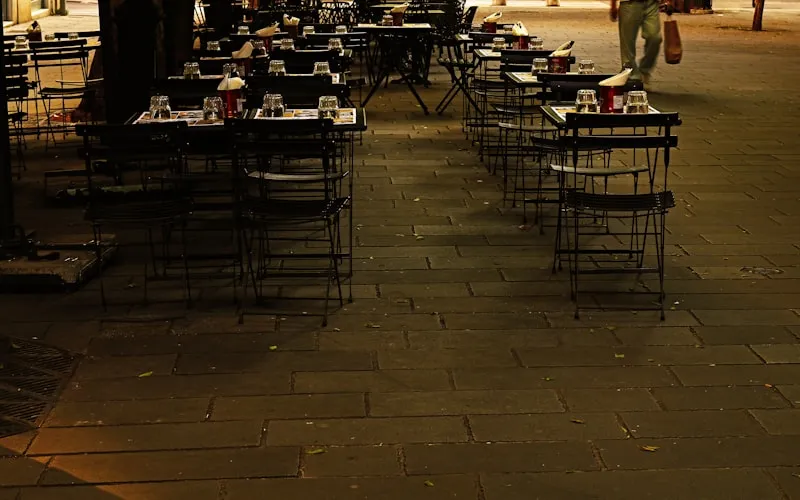 Restaurant dining area with booth seating and warm ambient lighting