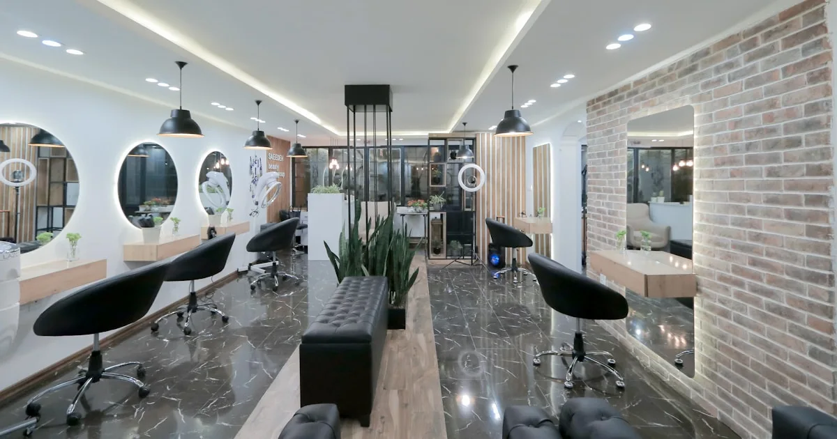 Modern beauty salon interior with stylish furniture and lighting