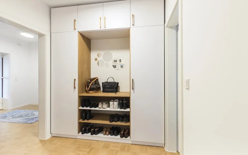 Built-in storage solutions maximizing space in a compact apartment