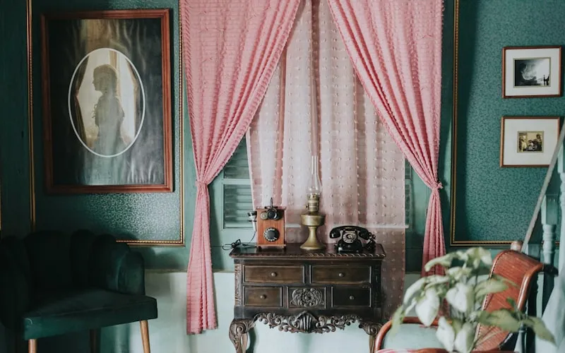 Eclectic interior mixing vintage and modern styles with bold color choices