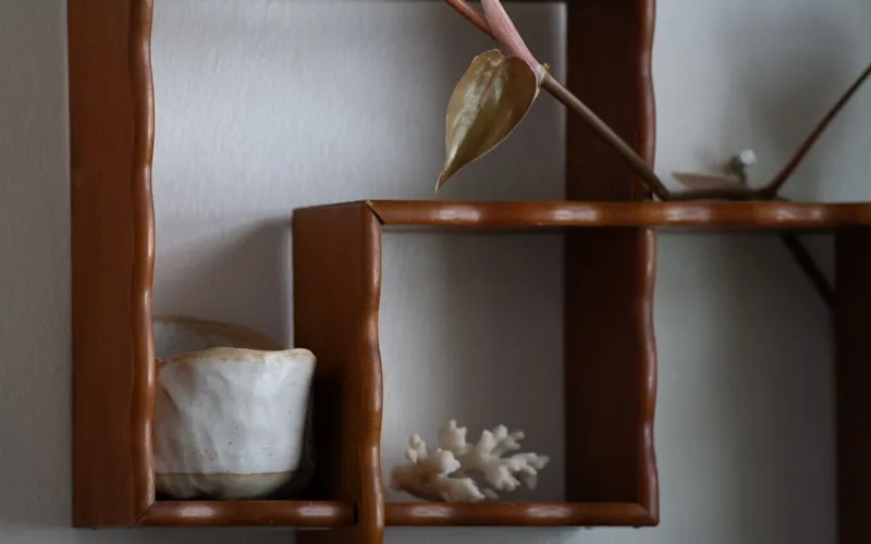 Wabi-sabi inspired zen interior featuring handcrafted ceramics and natural wood